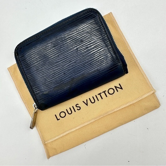 Authentic Louis Vuitton Wallet. Preowned. Color: Navy Blue.